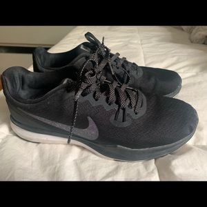 Nike black training sneakers w purple/green logo